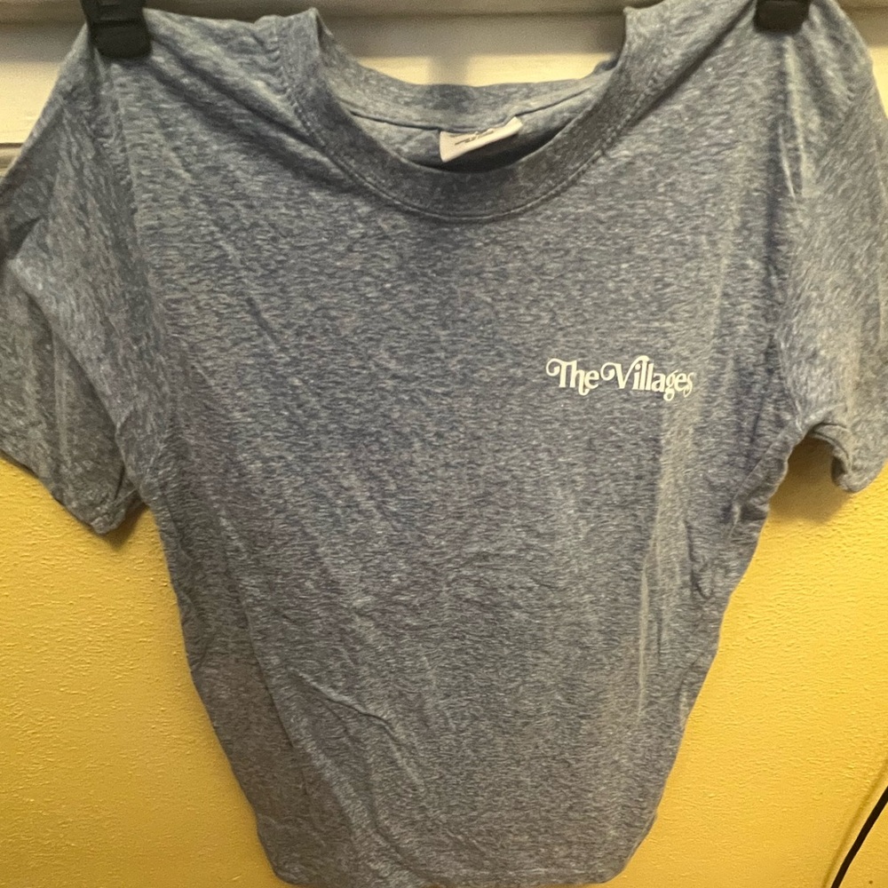 The Villages heathered blue cotton tshirt size Medium -loofah not included iykyk